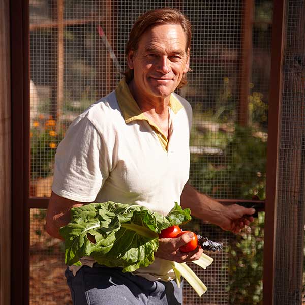 Darin Olien in his garden